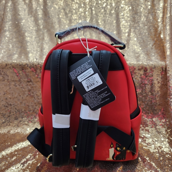 hocus pocus dani binx mini backpack Loungefly Tarot Card Iridescent Backpack: Clothing, Shoes & Jewelry century boy named Thackery Binx is transformed into an immortal black cat when he fails to rescue his sister from the Sanderson witches Loungefly Disney Hocus Pocus Binx